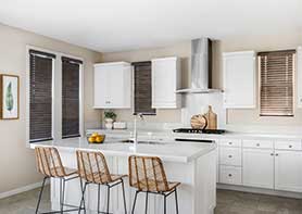 Wood Blinds in a White Kitchen