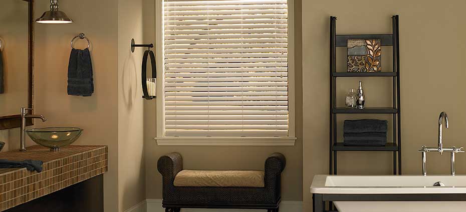 Whit Wooden Blinds and More! White wood blinds in a peaceful bathroom