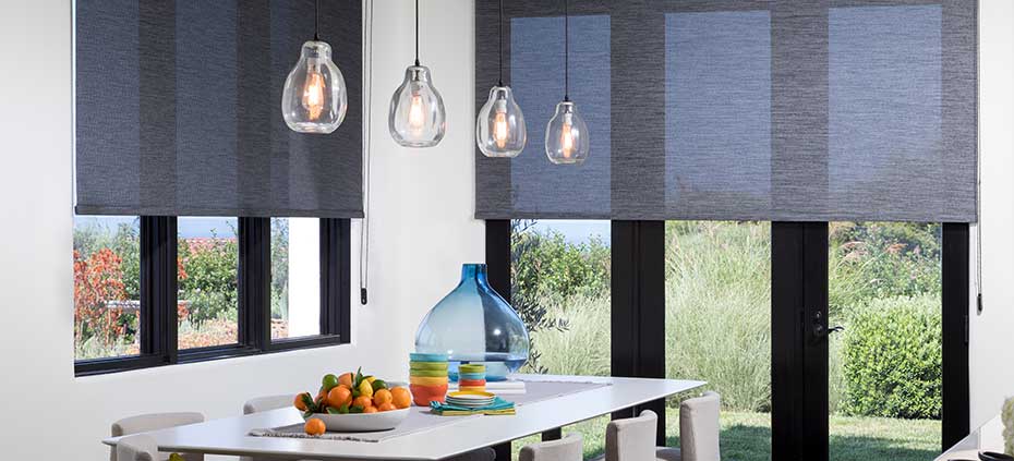Grey transparent roller shades in a modern kitchen
