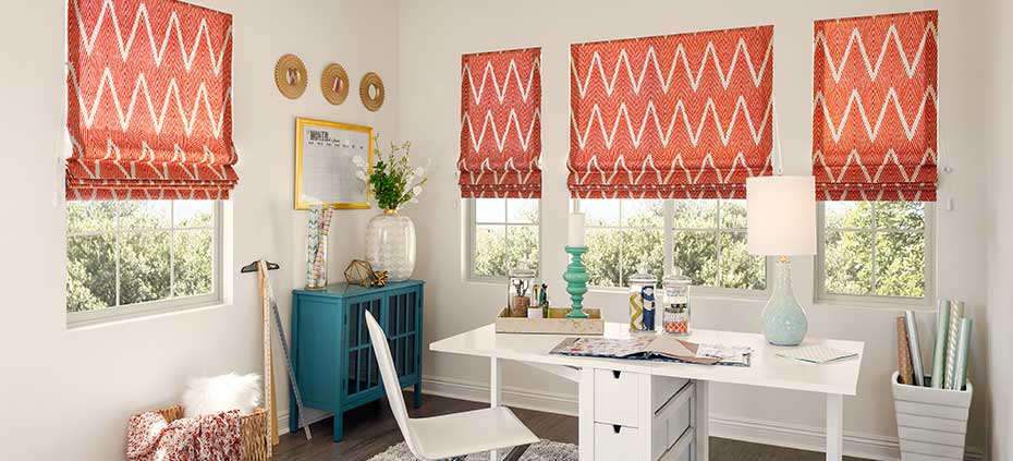 Orange and White chevron soft roman shades in home office