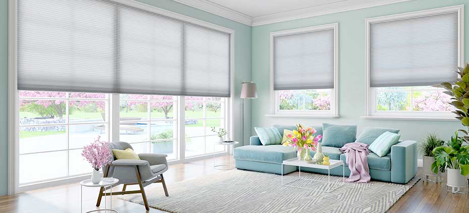 Bright living room with blue cellular shades